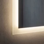 Close-up of sandblasted rim LED mirror edge detail showing frost lighting effect